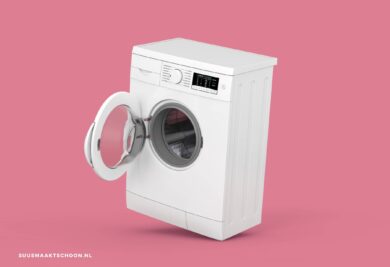 Witte wasmachine met open deur: zuinig leven