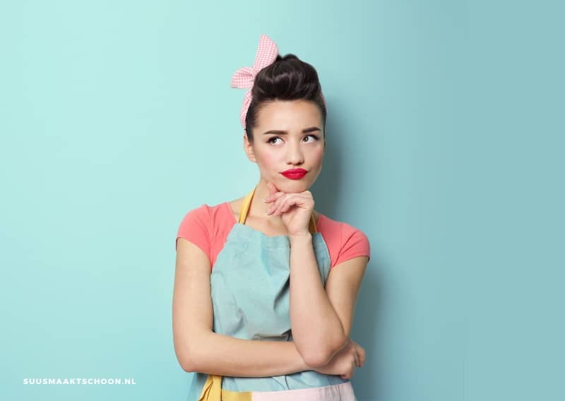 meestgestelde vragen over schoonmaken: retro vrouw kijkt bedenkelijk